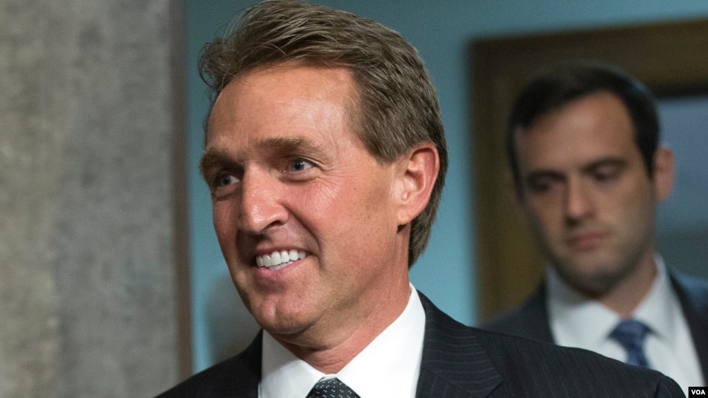 FILE - In this July 23, 2015 file photo, Sen. Jeff Flake, R-Ariz. walks on Capitol Hill, in Washington. (AP Photo/Andrew Harnik)