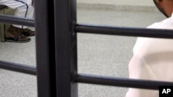 FILE - Detainees are seen in a cell at Dubai's central prison.