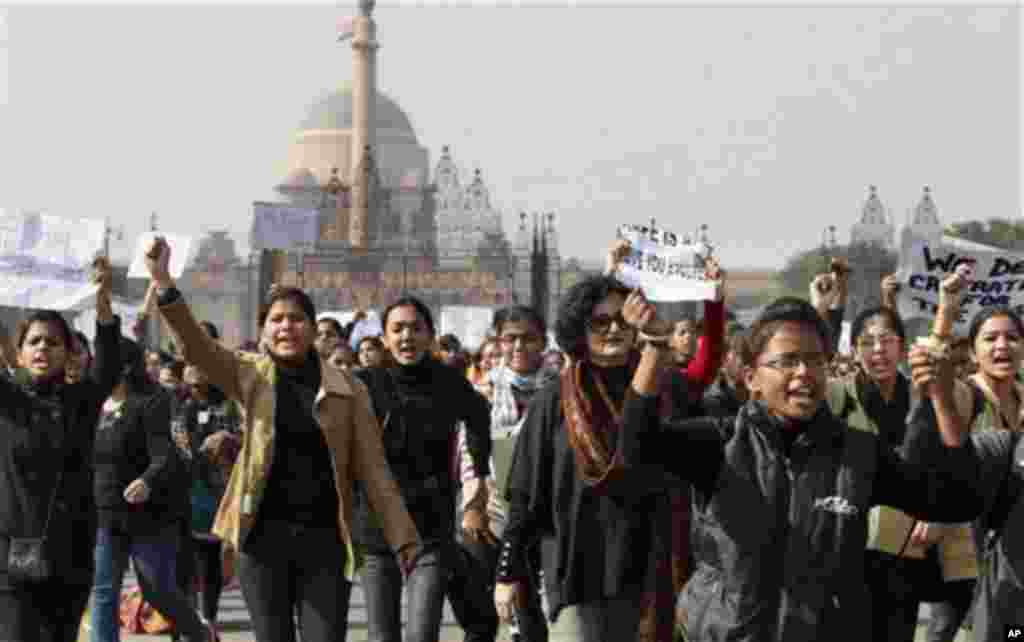 Activist of the All India Democratic Women’s Association and Young Women’s Christian Association (YWCA) students shout slogans as they take part in a protest march from the Presidential Palace to India Gate in New Delhi, India, Friday, Dec. 21, 2012.