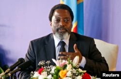FILE - Democratic Republic of Congo’s president, Joseph Kabila, addresses a news conference at the State House in Kinshasa, Democratic Republic of Congo, Jan. 26, 2018.