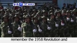 VOA60 World PM- Forces parade in Baghdad to remember the 1958 Revolution and celebrate recent victories over ISIS