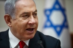 Israeli Prime Minister Benjamin Netanyahu chairs the weekly cabinet meeting in Jerusalem, March. 8, 2020.