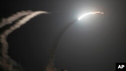 A Tomahawk cruise missile is launched at Islamic State group positions in Syria Sept 23, 2014.