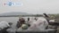 VOA60 Africa - DR Congo: Internally displaced people leaving Bulengo camp near Goma
