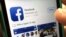 L'application Facebook sur un iPhone aux Etats-Unis le 19 juin 2017. 