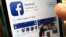 FILE - This photo shows Facebook launched on an iPhone, in North Andover, Massachusettds, June 19, 2017. 