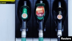 Fuel pumps are seen at a Shell petrol station in London, Jan. 31, 2013. 