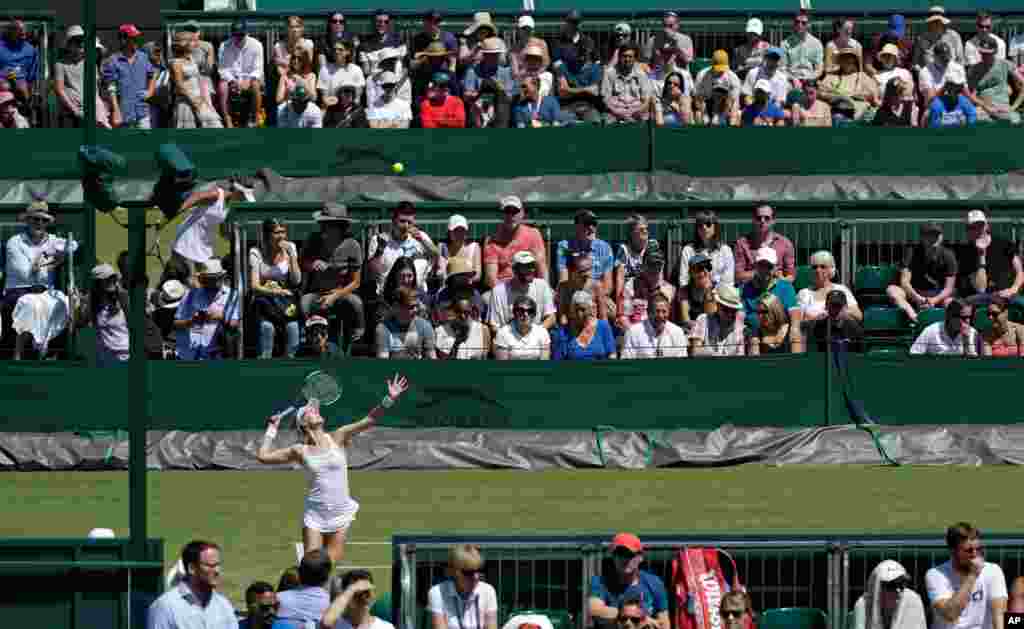 United States' Alison Riske serves to Serbia's Ivana Jorovic in a Women's singles match during day four of the Wimbledon Tennis Championships in London.