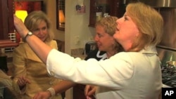 Congresswomen Carolyn Maloney, Melissa Bean and Debbie Wasserman Schultz, all Democrats, share a house in a neighborhood near the US Capitol