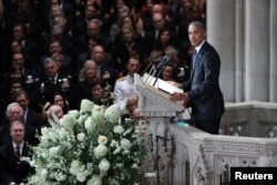 Former U.S. President Barack Obama speaks at a memorial service for the late Sen. John McCain, at National Cathedral in Washington, Sept. 1, 2018.