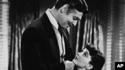Clark Gable, as Rhett Butler and Vivien Leigh as Scarlett O'Hara stars in the 1939 classic, "Gone With the Wind". 