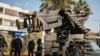 Security forces of the newly formed Syrian government man a checkpoint in downtown Homs, Syria, Dec. 26, 2024. 