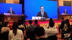 中国外长王毅在全国人大会议视频记者会上讲话。（2020年5月24日）