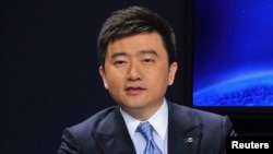 FILE - China Central Television (CCTV) host Rui Chenggang speaks during a conference in Dalian, Liaoning province, China. 