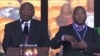 Mandela sign interpreter, Thamsanqa Jantjie (r)