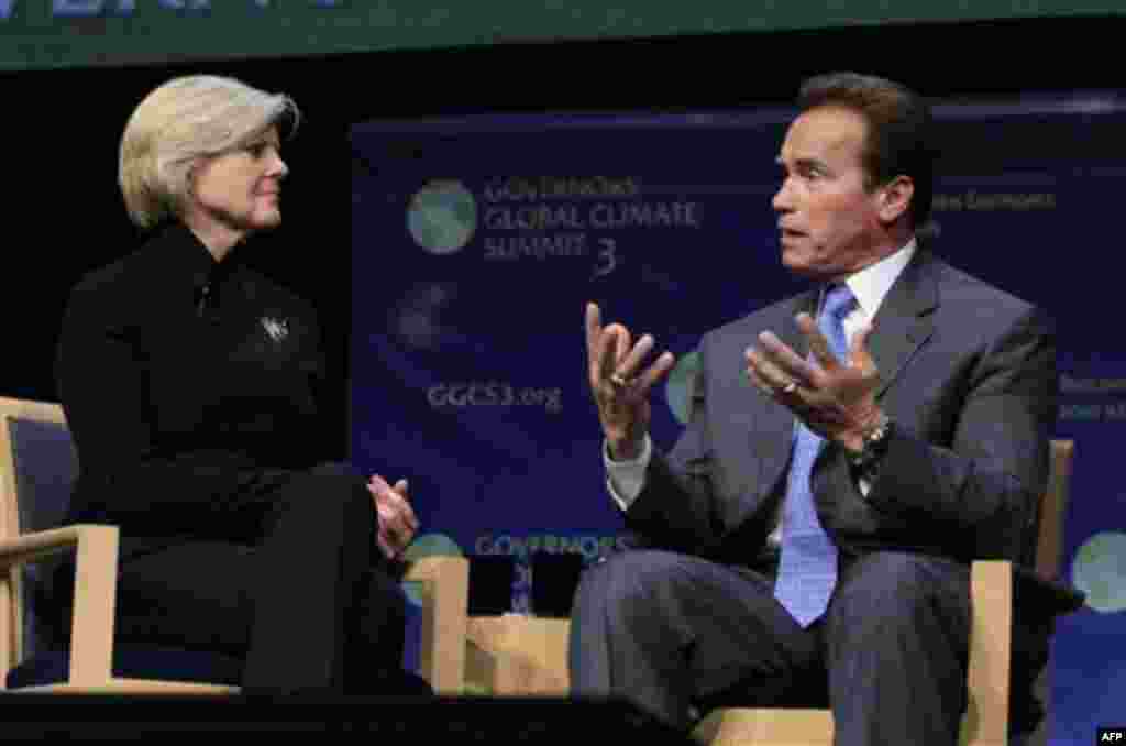 Gov. Arnold Schwarzenegger discusses the environment with NBC Chief Environmental Affairs Correspondent Anne Thompson, during the second day of the Governor's Global Climate Summit 3 held at the University of California, Davis, in Davis, Calif., Tuesday,