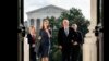 Judge Amy Coney Barrett, President Donald Trump&#39;s nominee to the Supreme Court, left, and Vice President Mike Pence arrive at the Capitol where she will meet with Senators in Washington, D.C.