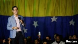 Juan Guaido, president of Venezuela's National Assembly, smiles as he speaks during a gathering in Caracas, Venezuela, Jan. 16, 2019. 