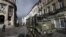 FILE - Belgian soldiers patrol in the neighborhood of Molenbeek, in Brussels, Belgium, Nov. 22, 2015, after security was tightened in Belgium following the fatal attacks in Paris. 