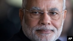 以压倒优势在大选中获胜的印度新总理纳伦德拉•莫迪