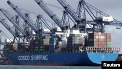 FILE - A China Ocean Shipping Company (COSCO) container ship is seen at the San Antonio port in Chile August 6, 2019. (REUTERS/Rodrigo Garrido)