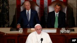 Pope Francis addresses Congress. Representative John Boehner sits on the right and wears a green tie. Vice President Joe Biden sits on the left. 