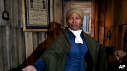 FILE - A wax likeness of Harriet Tubman, renowned abolitionist and conductor of the Underground Railroad, is unveiled at the Presidents Gallery by Madame Tussauds in Washington, Feb. 7, 2012.