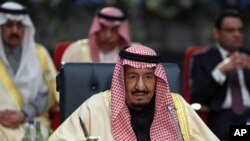 FILE - Saudi Arabia's King Salman attends a meeting of leaders at an EU-Arab summit in Sharm El Sheikh, Egypt, Feb. 24, 2019.