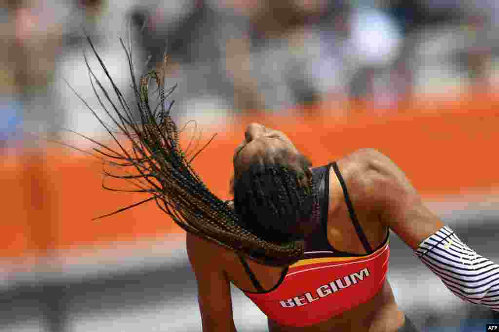 Belgium&#39;s Nafissatou Thiam competes in the Women&#39;s High Jump qualification round during the European Athletics Championships at the Olympic stadium in Amsterdam.