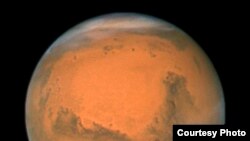 Gambar planet Mars yang diambil oleh Teleskop Antariksa Hubble dari jarak hanya 88 juta kilometer. (Foto: NASA)