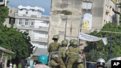 Polisi wakipiga doria katikia mitaa ya Zanzibar