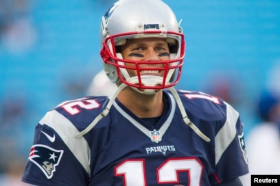 New England Patriots stand during national anthem before Panthers game