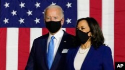 Los candidatos a presidente y vicepresidenta de EE.UU., Joe Biden y Kamala Harris, luego de anunciar su binomio el pasado miércoles, 12 de agosto de 2020.