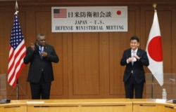 U.S. Secretary of Defense Lloyd Austin meets with his Japanese counterpart Defence Minister Nobuo Kishi in Tokyo, March 16, 2021.