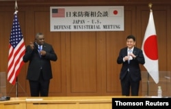 U.S. Secretary of Defense Lloyd Austin meets with his Japanese counterpart Defence Minister Nobuo Kishi in Tokyo, March 16, 2021.