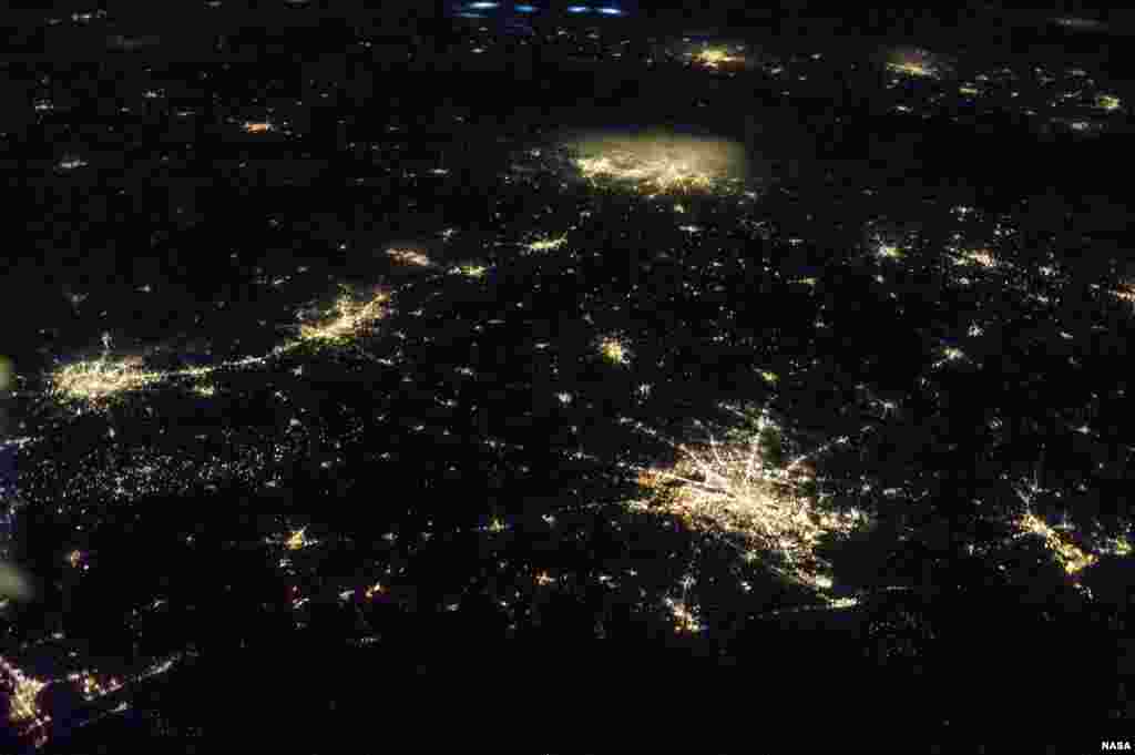 One of the Expedition 36 crew members aboard the International Space Station, some 240 miles above Earth, used a 50mm lens to record this oblique nighttime image of a large part of Texas, the nation&rsquo;s second largest state in area, including the four largest metropolitan areas in population.