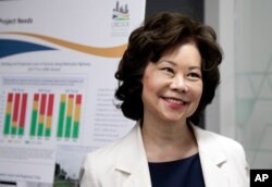 U.S. Transportation Secretary Elaine L. Chao smiles as she is briefed on the Lincoln, Neb., South Beltway Tiger Project, during a visit to Omaha, Neb., July 3, 2018.