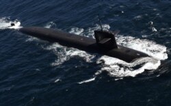 The submarine "Le Terrible" at sea during a visit to the vessel by French President Emmanuel Macron on July 4, 2017. (Fred Tanneau/Reuters)