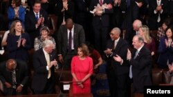 House Democratic leader Nancy Pelosi (D-CA) is applauded by U.S. Rep. Steny Hoyer (D-MD) and other members as she is nominated for House Speaker as the U.S. House of Representatives meets for the start of the 116th Congress on Capitol Hill in Washington, Jan. 3, 2019.