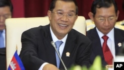 Cambodian Prime Minister Hun Sen spoke to the lower house of parliament in a nationally televised speech Thursday, Aug. 9, 2012, that was mandatory viewing for civil servants.