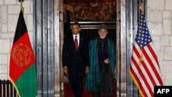 Слева направо: Барак Обама, Хамид Карзай.