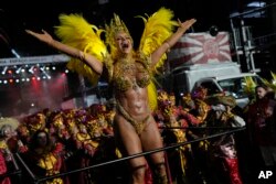 FILE - Drum queen Viviane Araujo, from Salgueiro samba school, performs during Carnival celebrations at the Sambadrome in Rio de Janeiro, Brazil, February 12, 2024