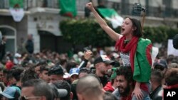A protester chants slogans during a demonstration against Algeria's leadership, in Algiers, April 12, 2019.