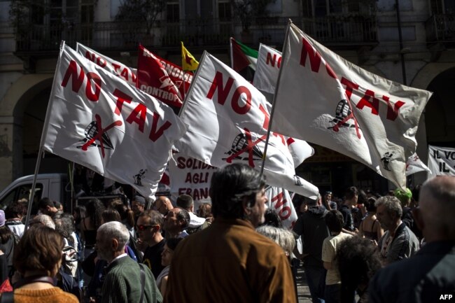 No Tav (No high speed train) demonstrators gather in Turin during one of several rallies against unemployment in Italy as people across the world mark May Day in Turin, May 1, 2019.
