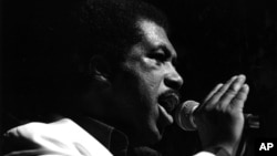 Ben E. King, the American soul singer and former member of The Drifters, is seen performing at the Palladium in London, England, on March 3, 1987.