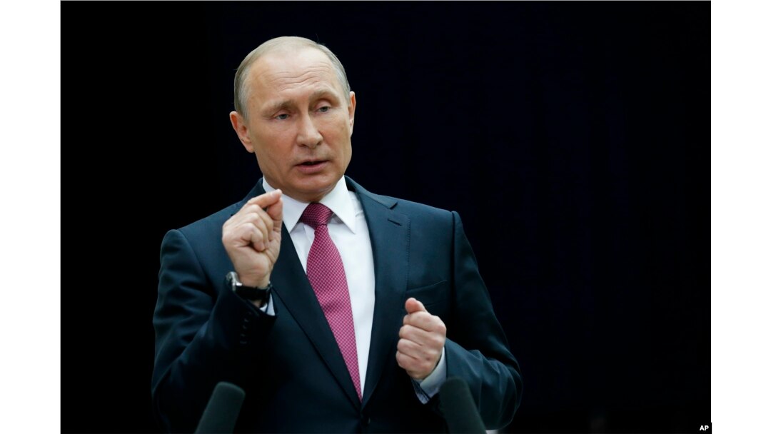 Russian President Vladimir Putin gestures while speaking to the media after his annual televised call-in show in Moscow, Russia, June 15, 2017. The 64-year old Russian leader mixed tough talk with benevolent promises while addressing disgruntled callers.
