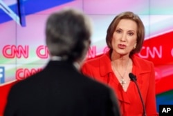 Carly Fiorina responds to debate moderator Wolf Blitzer during the CNN Republican presidential debate at the Venetian Hotel & Casino on Dec. 15, 2015, in Las Vegas.