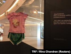 A display at an exhibition featuring clothing worn by victims at the time of sexual assault in Bangkok, Thailand, June 29, 2018.