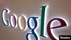 A Google sign is seen at a Best Buy electronics store in Encinitas, California, Apr. 11, 2013.