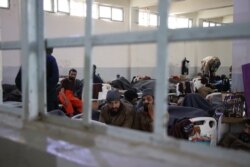 There are about 12,000 suspected IS fighters from 55 countries being held without formal charges in northeastern Syria, and officials say they do not have the capacity to secure them indefinitely, in Hasseka, Syria, Feb. 16, 2021. (Heather Murdock/VOA)